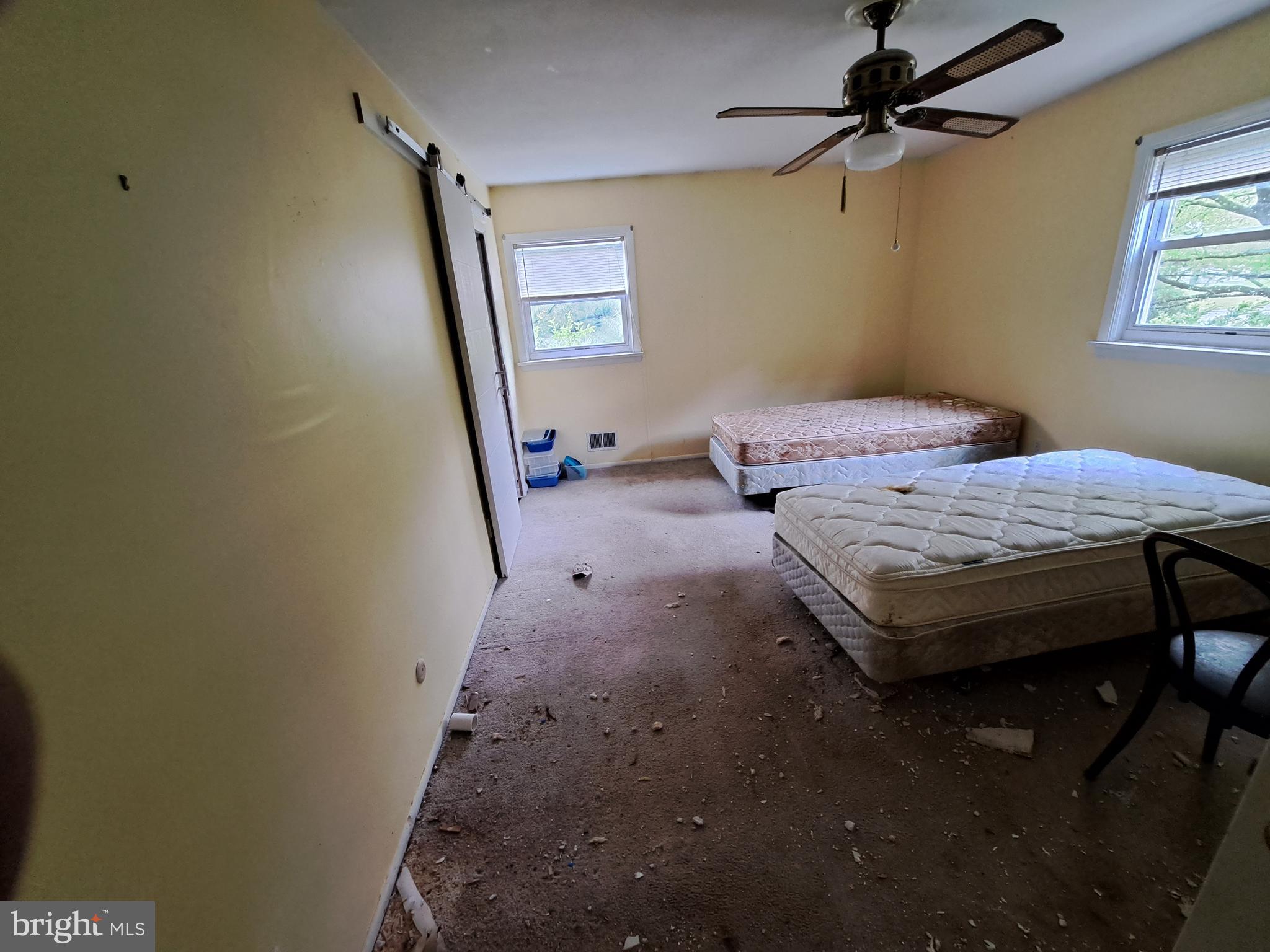 1371 Lower Ferry Road Ewing, NJ 08618 - Photo 10 of 18 a bedroom with a bed and a mirror