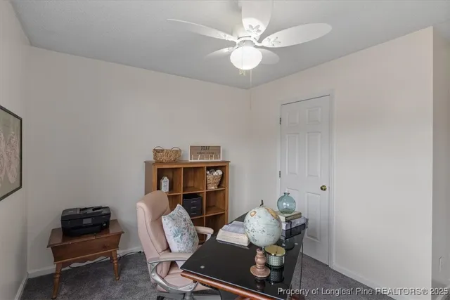 a bedroom with a bed dresser and a window