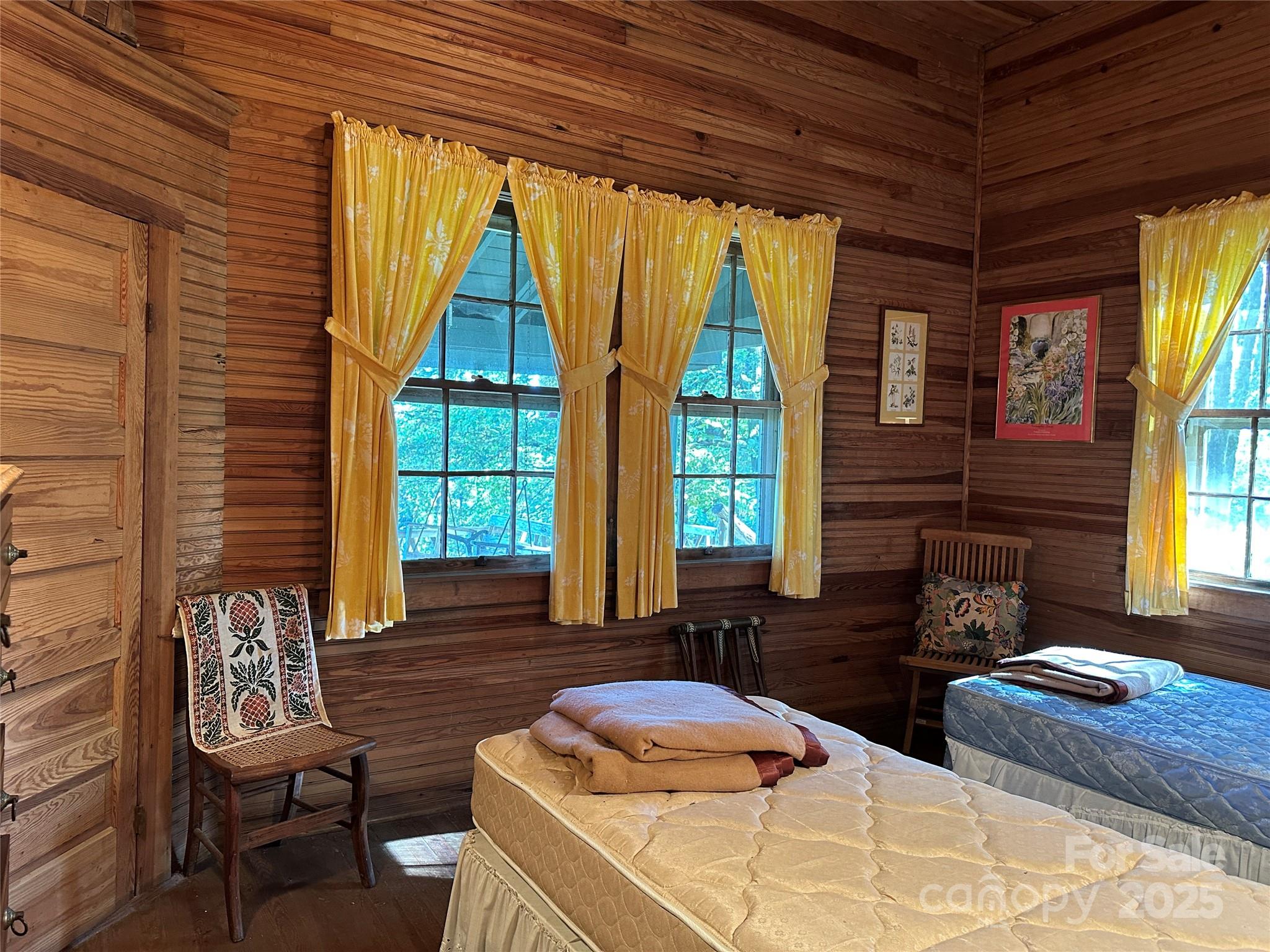 16 Osborn Knob Road Marion, NC 28752 - Photo 32 of 48 a bedroom with furniture and a window