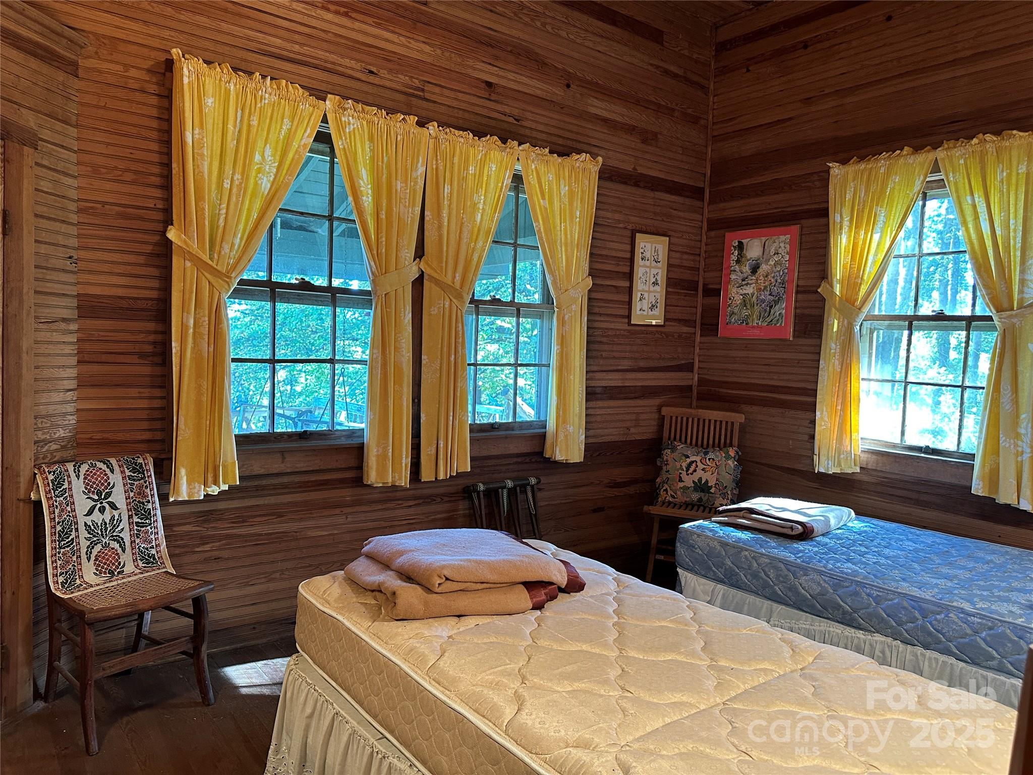 16 Osborn Knob Road Marion, NC 28752 - Photo 33 of 48 a bedroom with furniture and a window