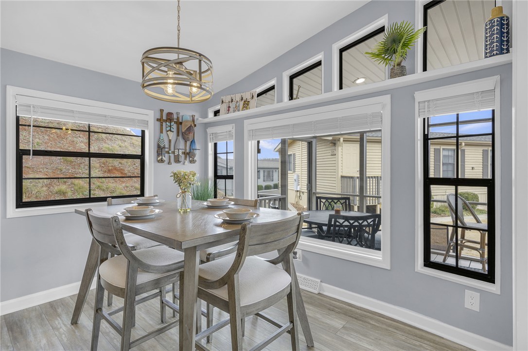 1230 Melton Road, Unit 15 West Union, SC 29696 - Photo 12 of 50 This dining area features an airy ambiance, perfect for gatherings and everyday living.