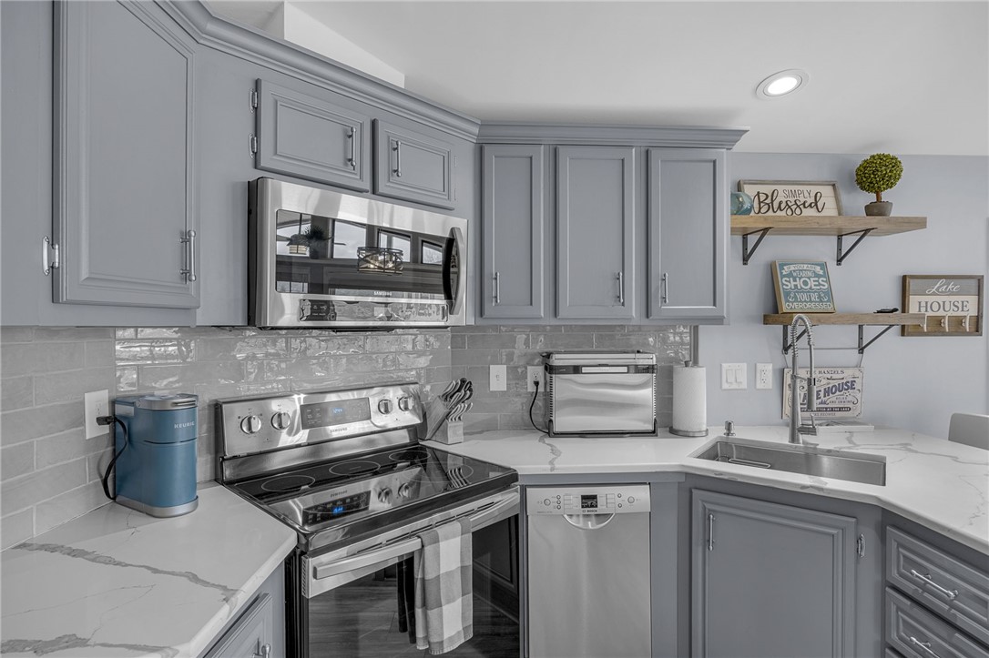 1230 Melton Road, Unit 15 West Union, SC 29696 - Photo 14 of 50 This modern kitchen features sleek appliances and ample cabinet space.