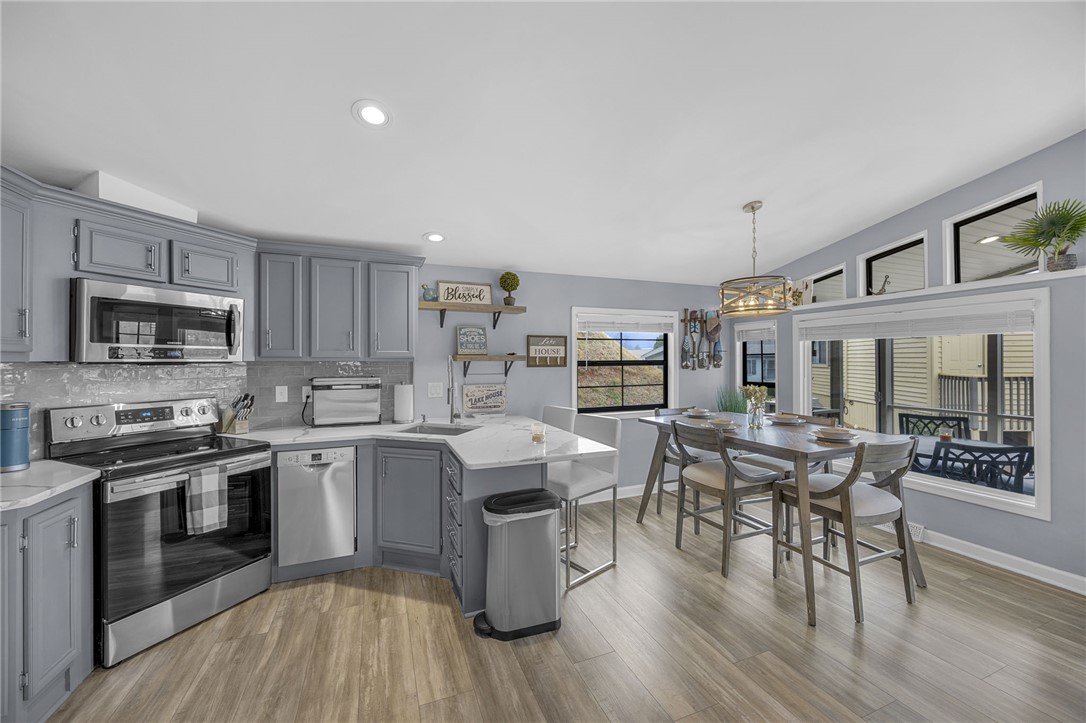 1230 Melton Road, Unit 15 West Union, SC 29696 - Photo 16 of 50 Bright and inviting kitchen and dining area, perfect for daily living and entertaining.