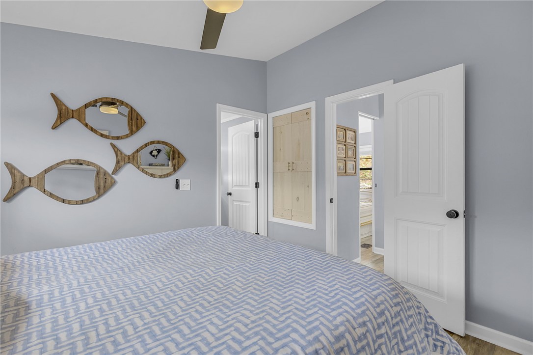 1230 Melton Road, Unit 15 West Union, SC 29696 - Photo 19 of 50 This spacious bedroom offers a tranquil retreat with comfortable furnishings and elegant design.