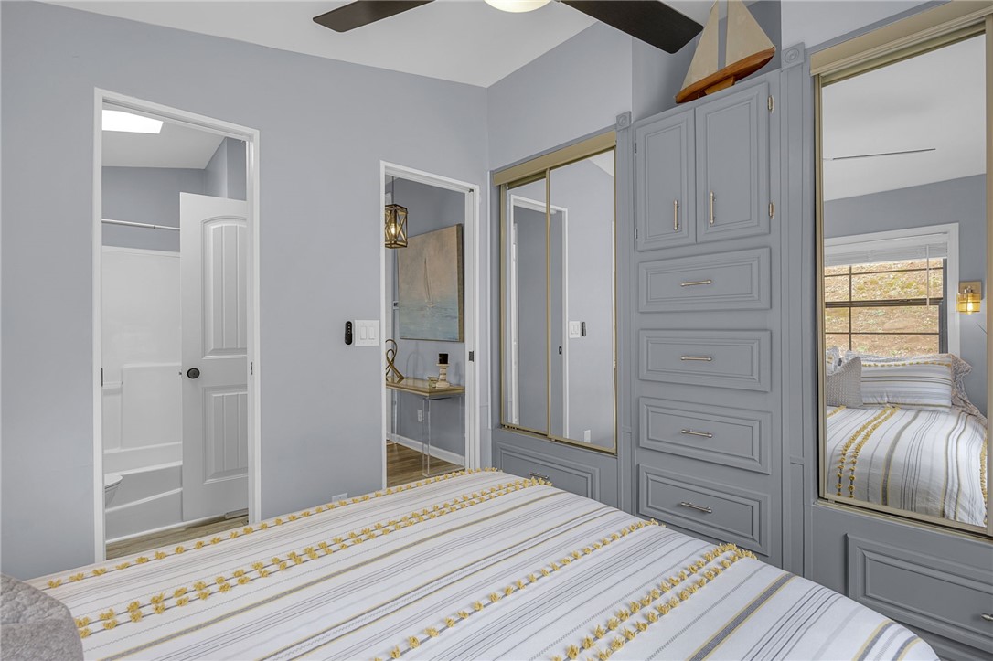 1230 Melton Road, Unit 15 West Union, SC 29696 - Photo 23 of 50 This spacious bedroom features ample storage and a private en-suite bathroom.