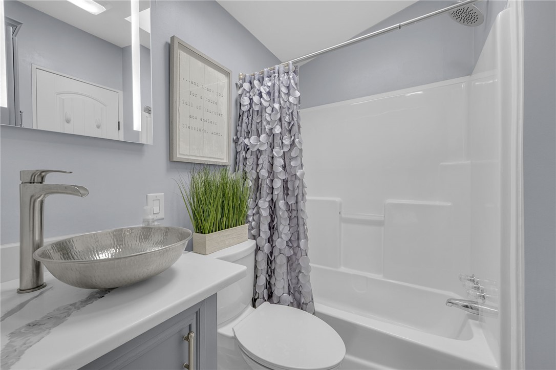 1230 Melton Road, Unit 15 West Union, SC 29696 - Photo 25 of 50 This bathroom features a contemporary vessel sink and a pristine bathtub with shower.