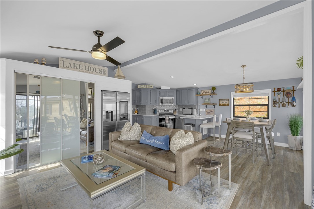 1230 Melton Road, Unit 15 West Union, SC 29696 - Photo 8 of 50 This versatile open-concept living space integrates comfort with essential amenities for daily life.