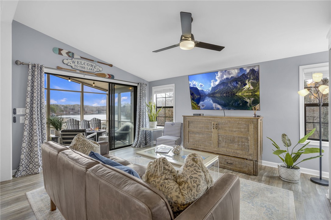 1230 Melton Road, Unit 15 West Union, SC 29696 - Photo 9 of 50 This inviting living space features expansive views of the serene lake.