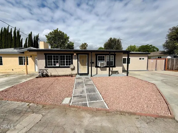 a view of a house with a patio