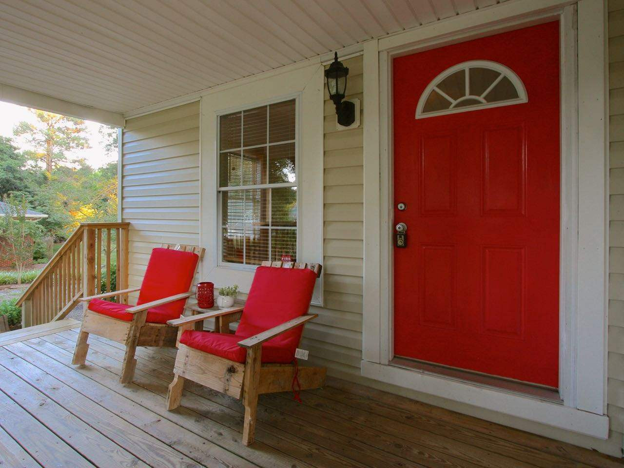 1310 Carpenter Fletcher Road Durham, NC 27713 - Photo 15 of 23 There are great porches in the front and in the back. Front porch