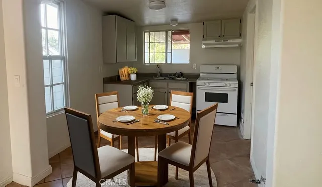 a view of a dining room with furniture