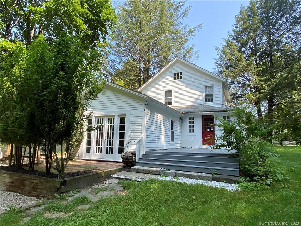 86 Greenwoods Road East Norfolk, CT 06058 - Photo 1 of 1 a view of a house with a yard and large tree