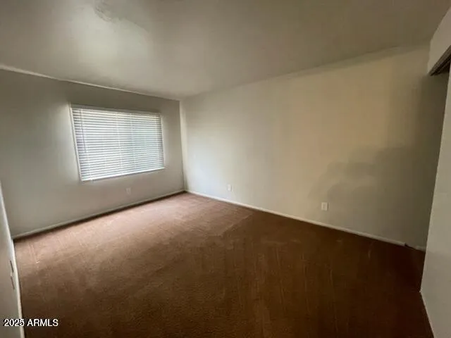 an empty room with a window