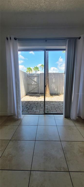 1928 South Conway Road, Unit 1 Orlando, FL 32812 - Photo 23 of 34 a bathroom with a glass door shower and a sink