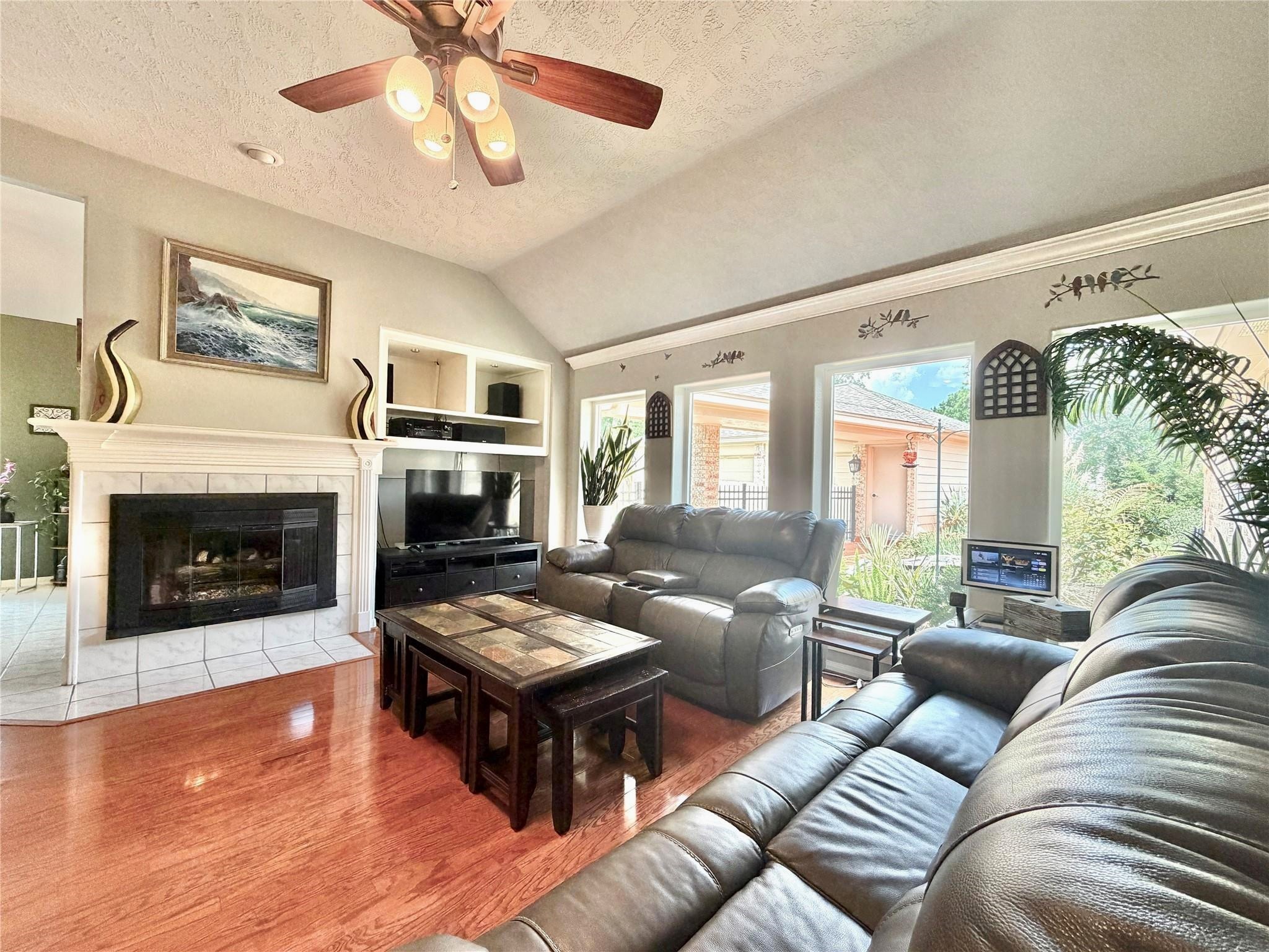 24818 Haverford Road Spring, TX 77389 - Photo 14 of 45 Family Room w/Gas Fireplace, Built-In Media Cabinet, and gorgeous view of the park-like back yard.