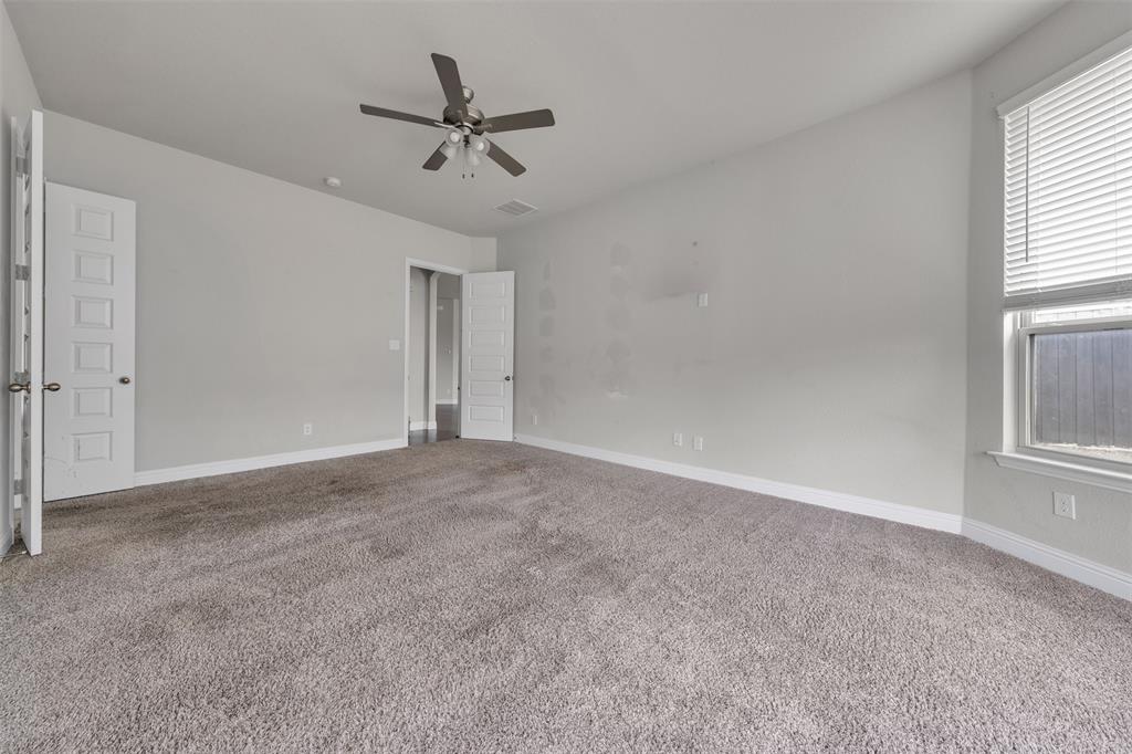 1802 Graham Way Mansfield, TX 76063 - Photo 16 of 38 a view of a livingroom with a ceiling fan and window