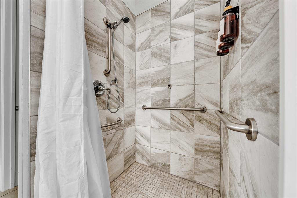 1802 Graham Way Mansfield, TX 76063 - Photo 19 of 38 a bathroom with a shower