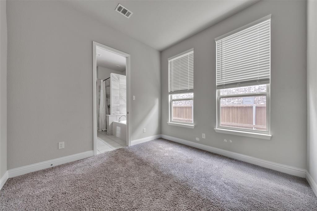 1802 Graham Way Mansfield, TX 76063 - Photo 22 of 38 a view of an empty room with a window