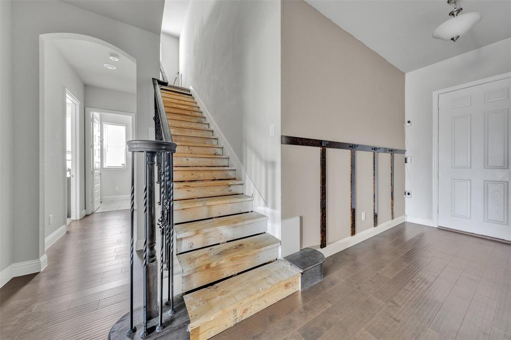1802 Graham Way Mansfield, TX 76063 - Photo 24 of 38 a view of a hallway with wooden floor and entryway