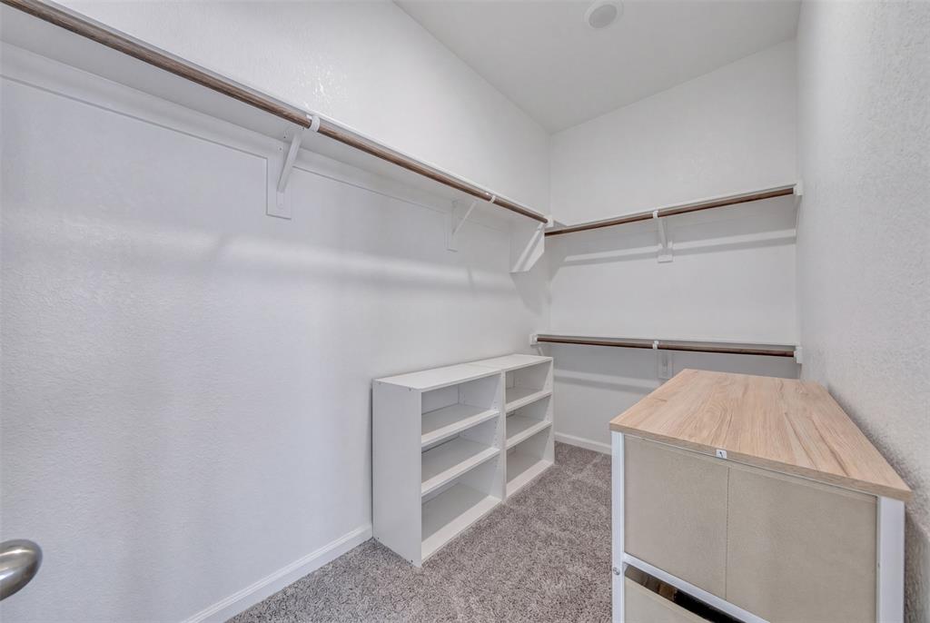 1802 Graham Way Mansfield, TX 76063 - Photo 27 of 38 a view of an empty walk in closet