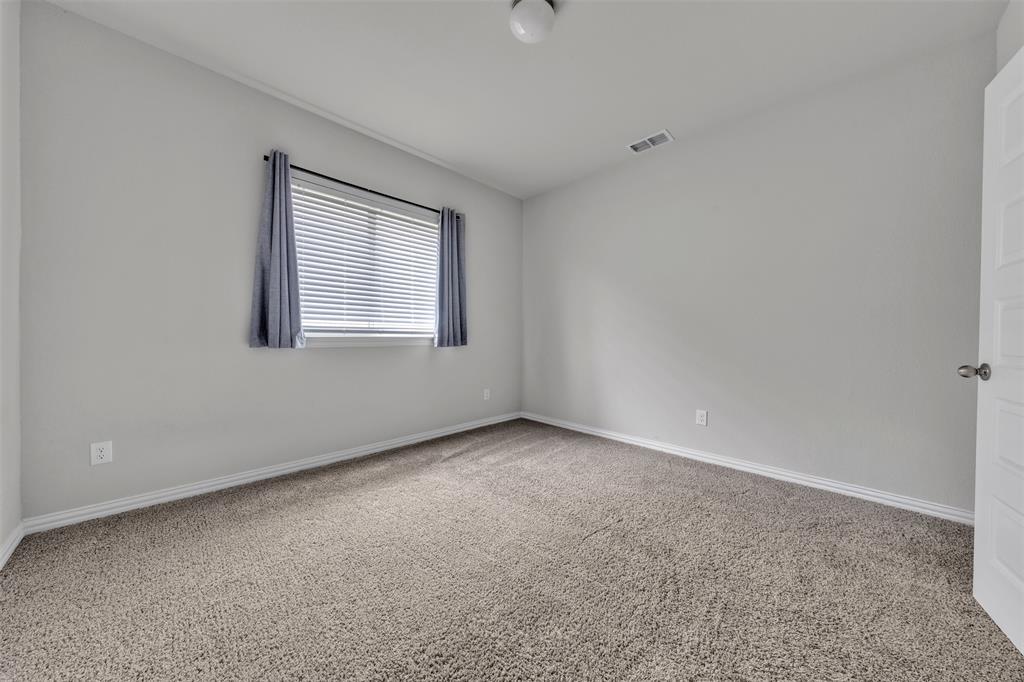 1802 Graham Way Mansfield, TX 76063 - Photo 30 of 38 an empty room with a window
