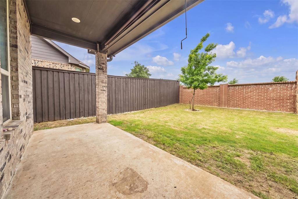 1802 Graham Way Mansfield, TX 76063 - Photo 35 of 38 a house view with pool in front of it