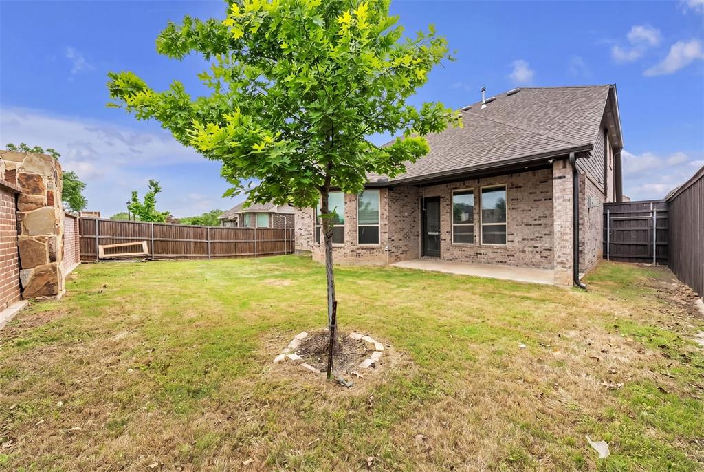 1802 Graham Way Mansfield, TX 76063 - Photo 36 of 38 a house view with a garden space