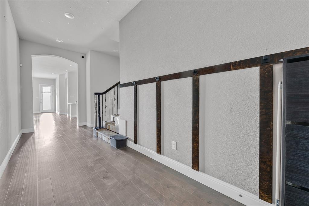 1802 Graham Way Mansfield, TX 76063 - Photo 4 of 38 a view of a hallway with staircase