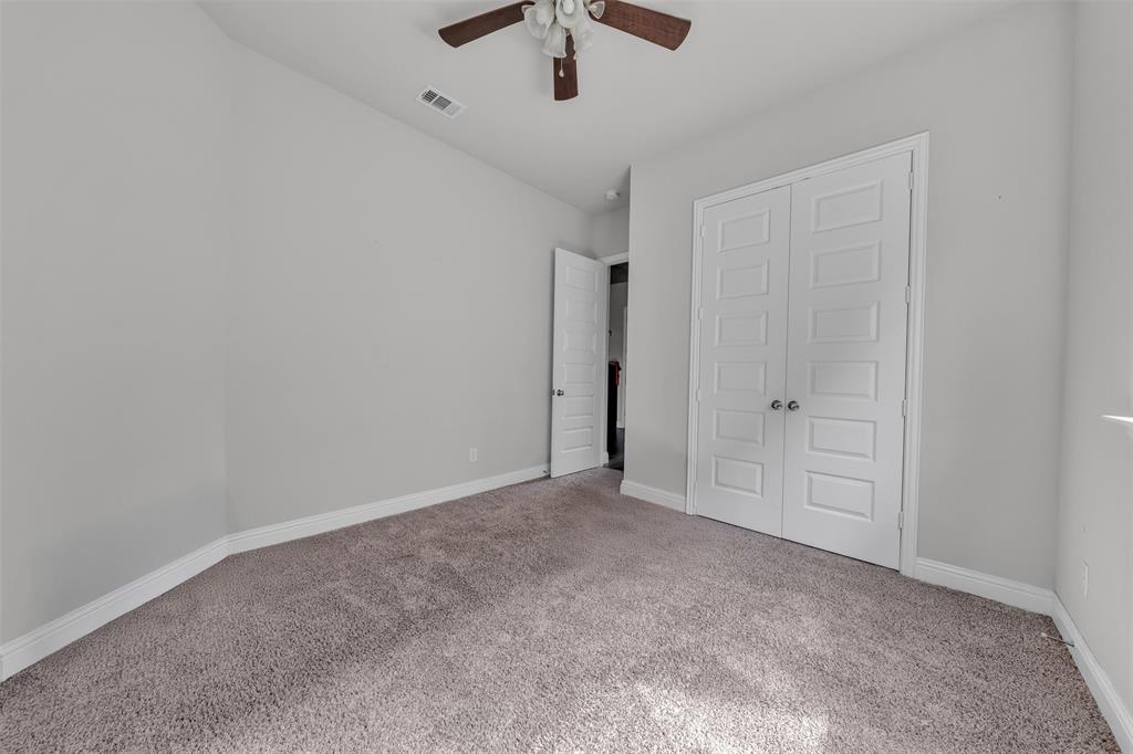 1802 Graham Way Mansfield, TX 76063 - Photo 9 of 38 a view of an empty room and chandelier fan