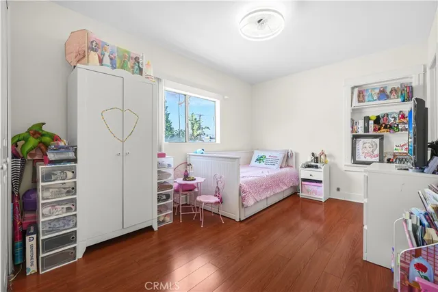 a bathroom with a toilet a sink and shower