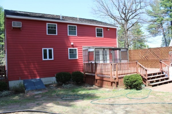 62 Edward Road Townsend, MA 01469 - Photo 12 of 14 a front view of a house with a yard