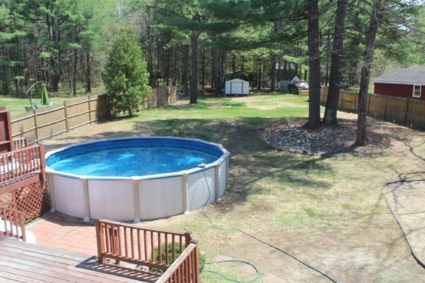 62 Edward Road Townsend, MA 01469 - Photo 2 of 14 a view of a backyard with fountain