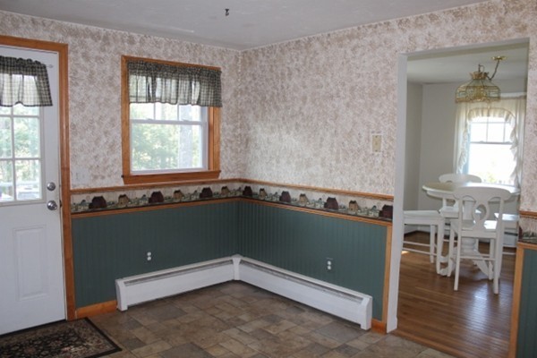62 Edward Road Townsend, MA 01469 - Photo 4 of 14 an empty room with wooden floor and windows