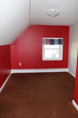 62 Edward Road Townsend, MA 01469 - Photo 10 of 14 a view of a livingroom with an empty space and a window