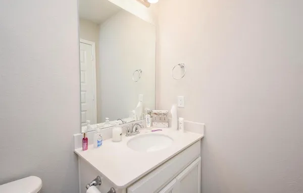 a bathroom with a sink and a toilet