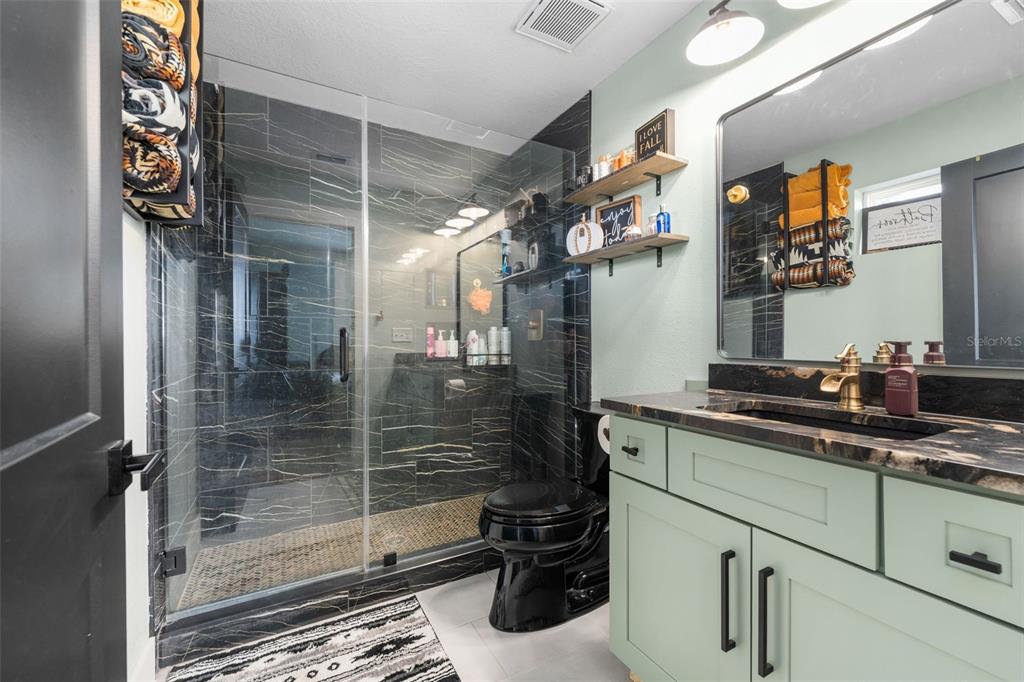 23220 Northwest 27 Street Morriston, FL 32668 - Photo 15 of 44 a kitchen with a sink and cabinets