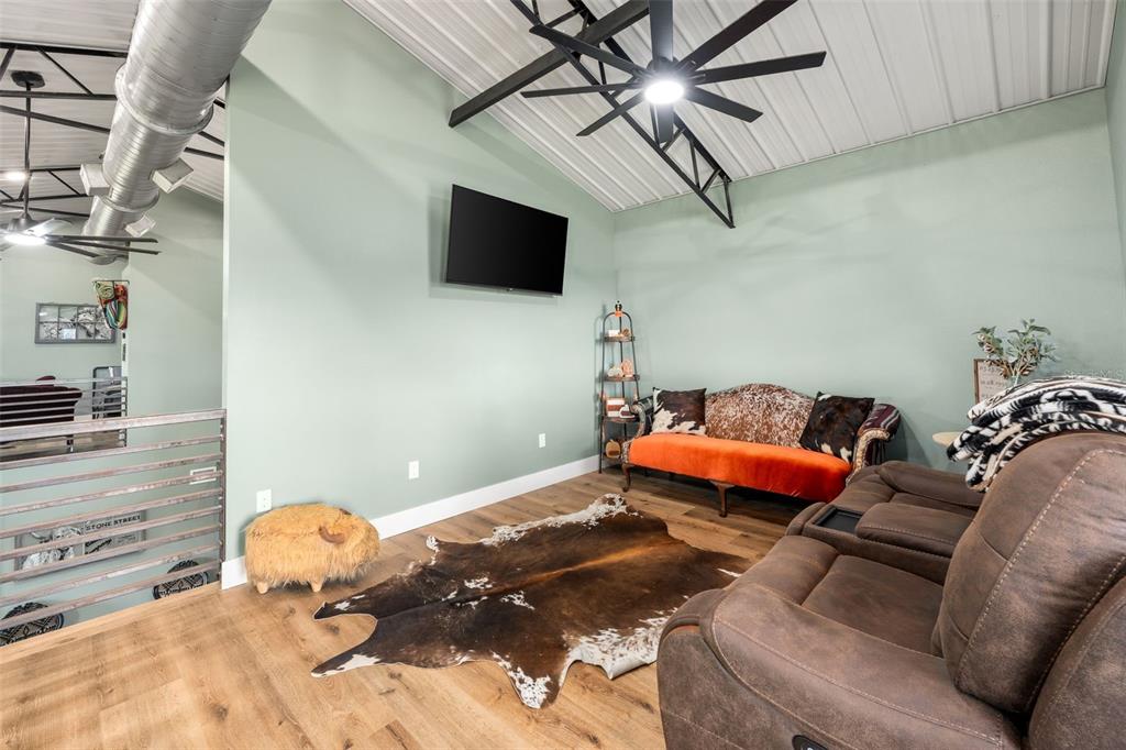 23220 Northwest 27 Street Morriston, FL 32668 - Photo 24 of 44 a backyard of a house with table and chairs