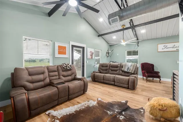 a living room with furniture and a window
