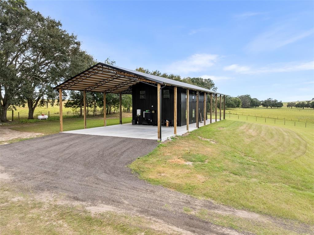 23220 Northwest 27 Street Morriston, FL 32668 - Photo 29 of 44 a view of a house with a yard