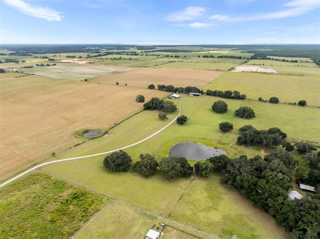 23220 Northwest 27 Street Morriston, FL 32668 - Photo 41 of 44 a view of an ocean and beach