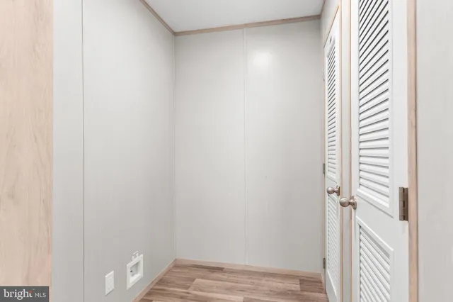 a view of a bedroom from a hallway