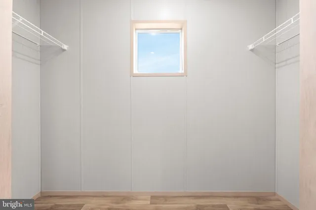 a view of a room with racks on the wall