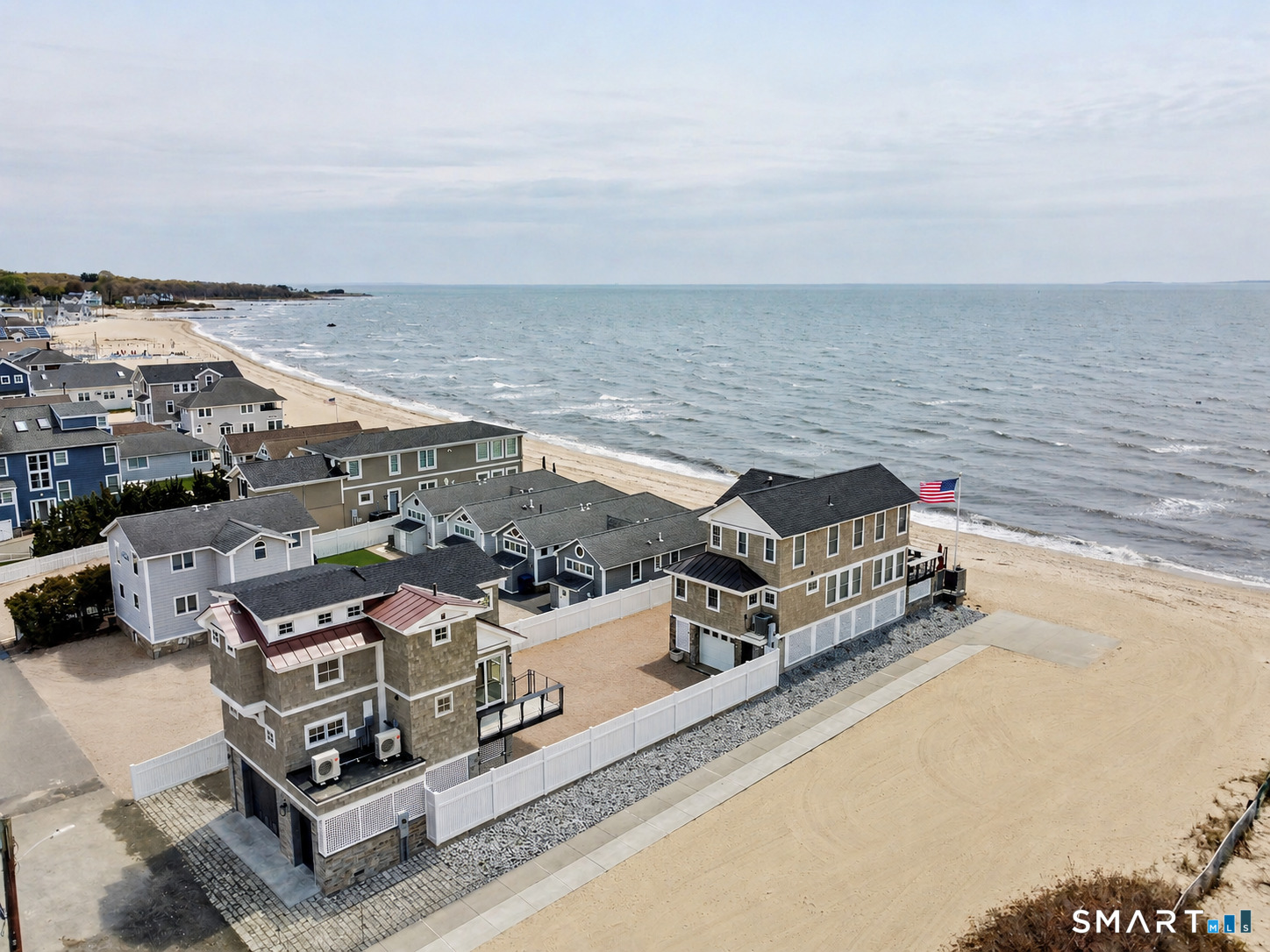 40 Pond Road Old Lyme, CT 06371 - Photo 1 of 35 an aerial view of a ocean with beach