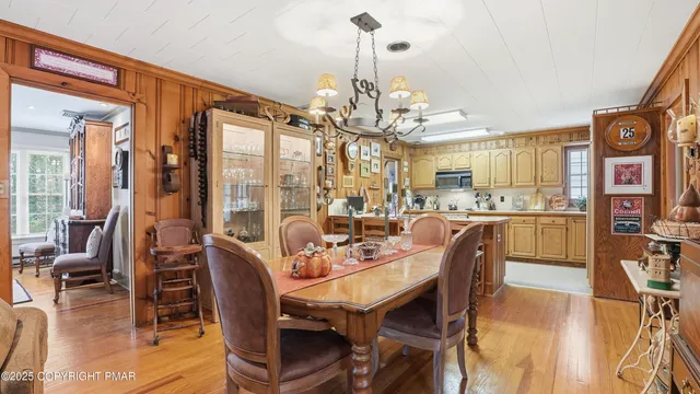 a kitchen with stainless steel appliances a sink stove and cabinets