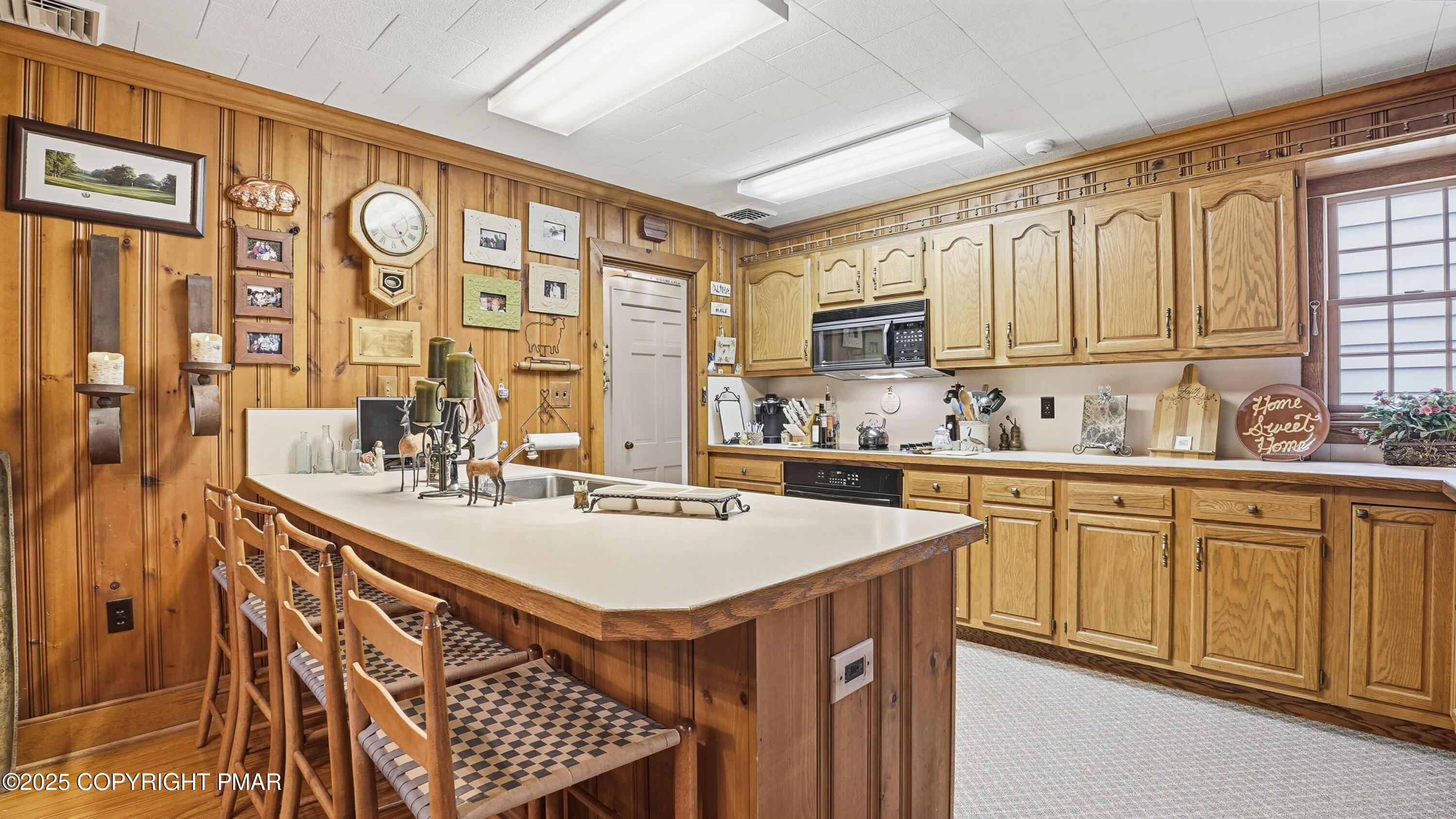 519 Pheasant Lane Cresco, PA 18326 - Photo 15 of 79 a kitchen with stainless steel appliances a sink stove and cabinets