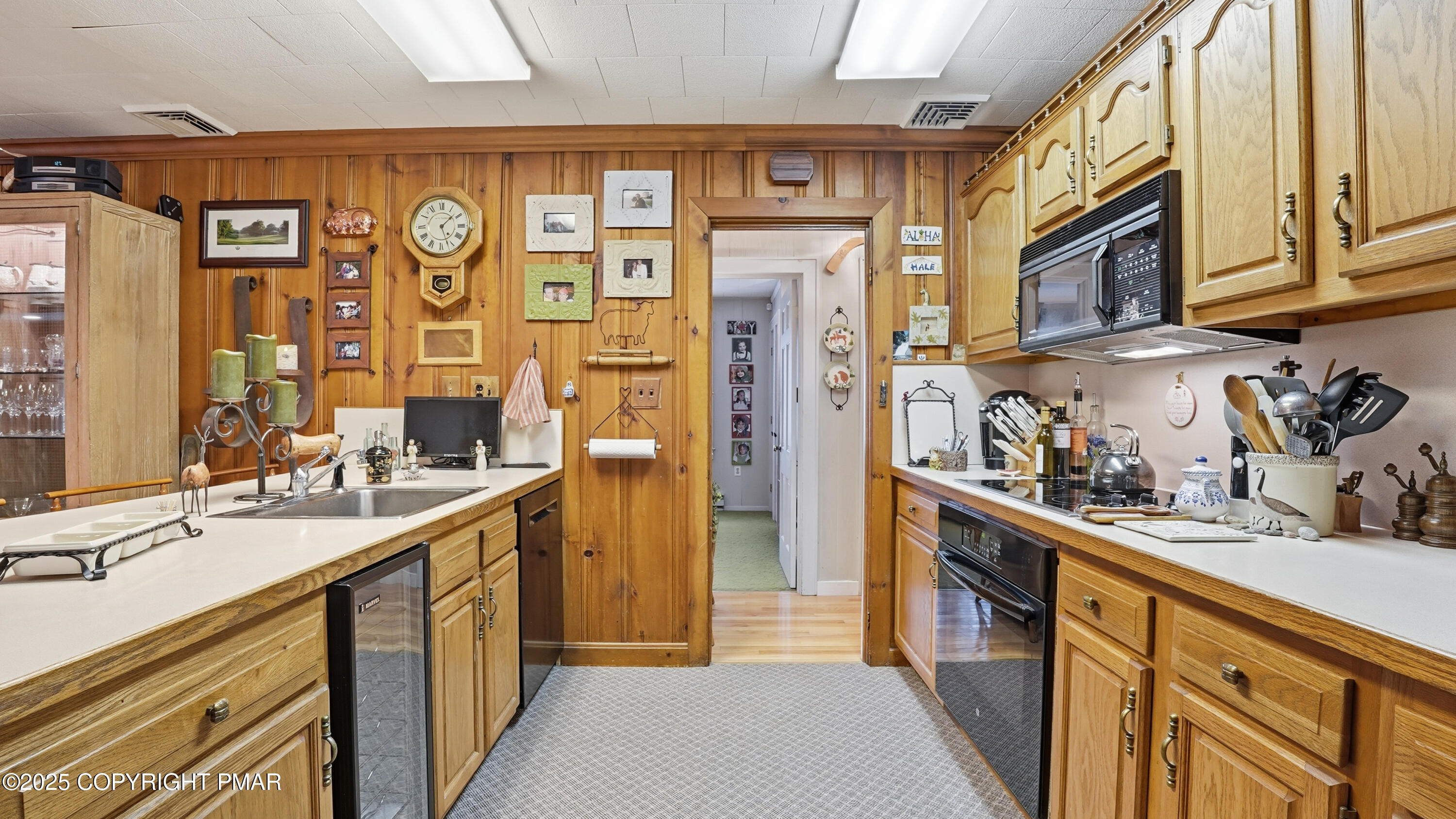 519 Pheasant Lane Cresco, PA 18326 - Photo 18 of 79 a kitchen with stainless steel appliances granite countertop a sink and cabinets