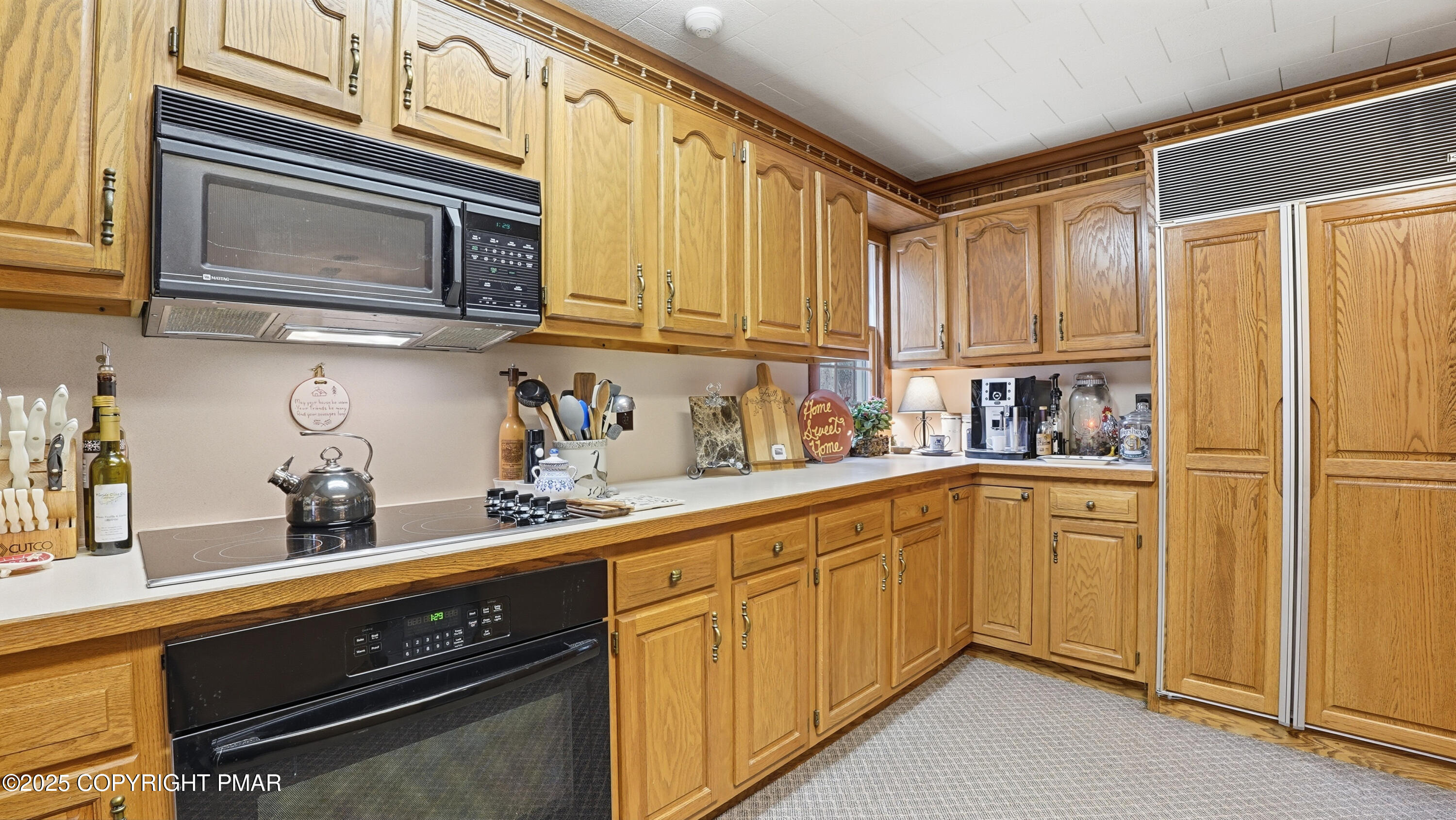 519 Pheasant Lane Cresco, PA 18326 - Photo 21 of 79 a kitchen with stainless steel appliances granite countertop a refrigerator and cabinets