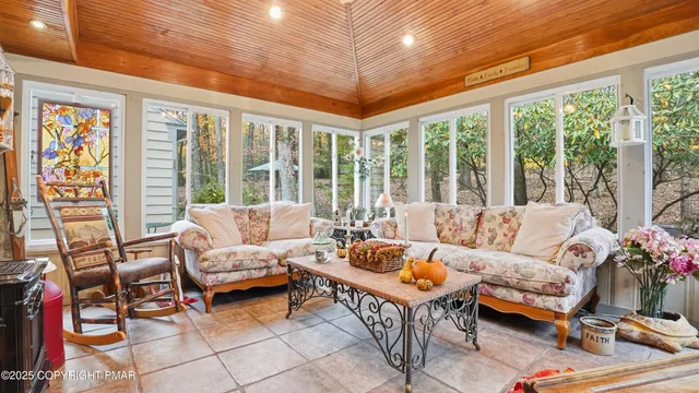 a spacious bathroom with double vanity a mirror and double