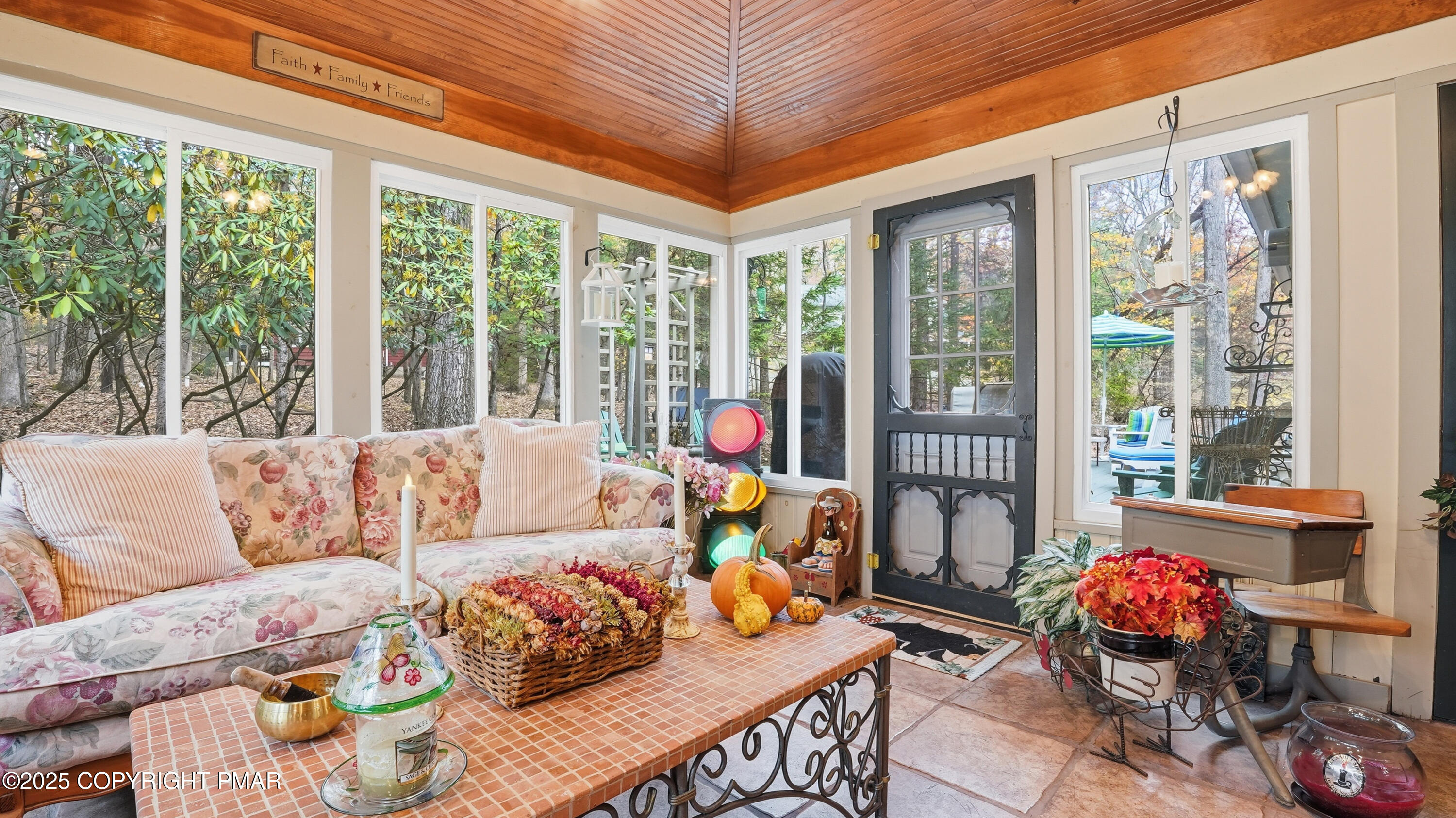 519 Pheasant Lane Cresco, PA 18326 - Photo 23 of 79 a living room with furniture and a floor to ceiling window