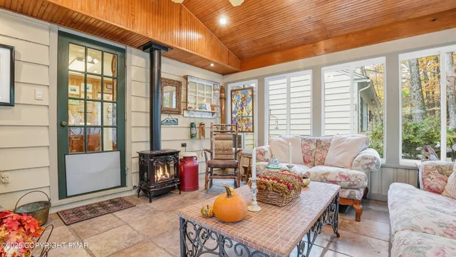 a bedroom with bed and a window